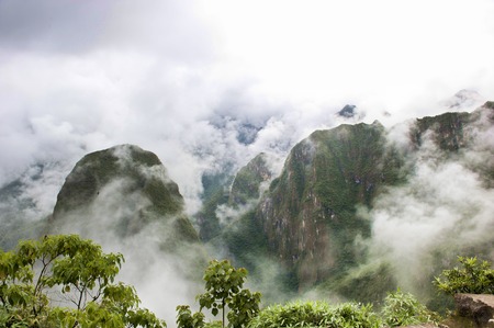 A view from Machu Picchu on a cloudy day.