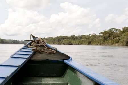 A view of the Amazon river in the Tambopata Province on a cloudy day.の写真素材