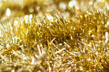 Golden christmas background. Simple and beautiful. Useful for making a greeting cards and using as a background for web.の写真素材