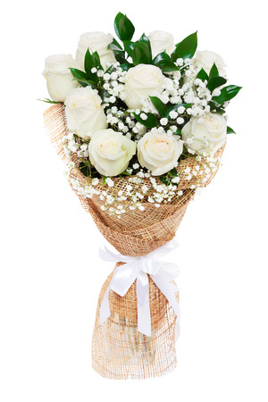 Bouquet of beautiful white roses isolated on white. A great gift to a woman for an anniversary, birthday, valentineの写真素材