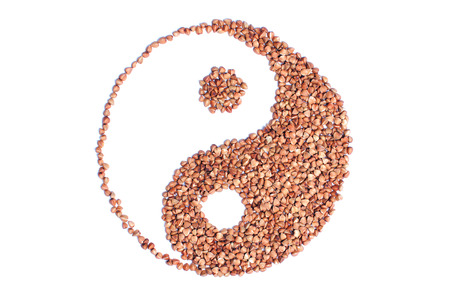 Buckwheat Yin and Yang asian symbol isolated on white backgroundの写真素材