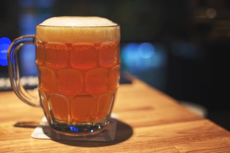 Mug of cold craft beer in pubの写真素材