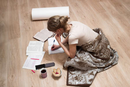 A girl doing her homework.の写真素材