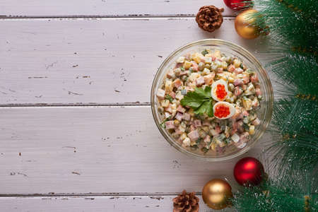 traditional russian salad (olivier) white background new years tree new year tree decorationsの写真素材