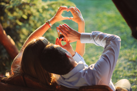 heart shape from couple handsの写真素材