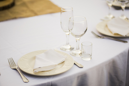 Banquet wedding table setting on evening receptionの写真素材