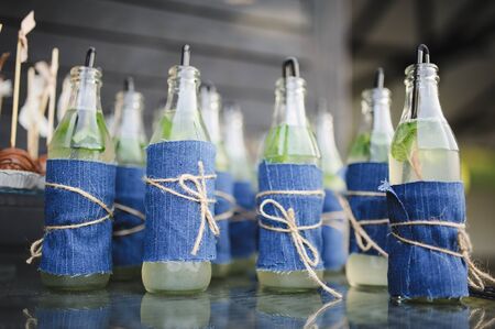 drink bottles boho style at a wedding reception partyの写真素材