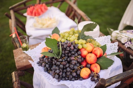 wedding decor fruits at restaurant with all beauty and flowersの写真素材