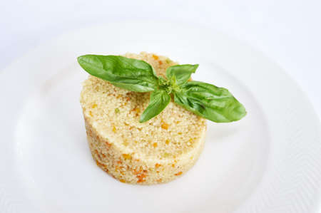 Couscous on white plate studio shot african foodの写真素材