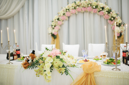 Banquet wedding table setting on evening reception awaiting guestsの写真素材