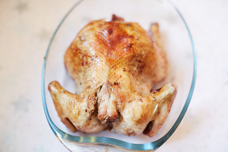 Homemade whole roasted chickenの写真素材