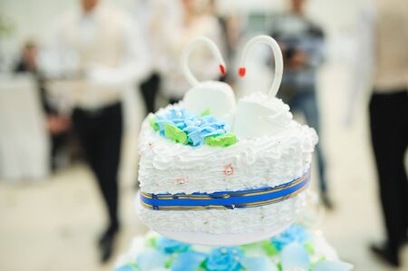 White Wedding Cake with swanの写真素材