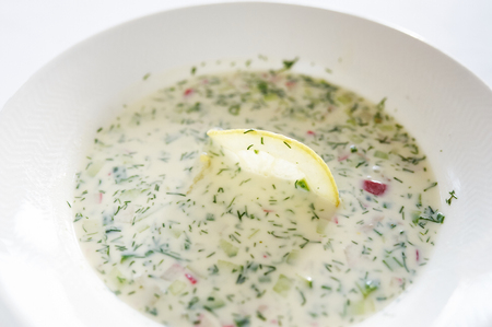 Vegetable hash on white plate studio shotの写真素材