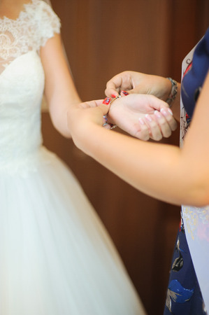 bride getting dressed on her best day everの写真素材