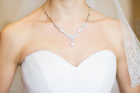 a woman's neck line on her wedding day.の写真素材
