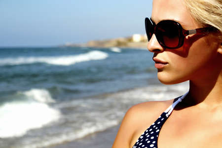 Beautiful blond woman on the beachの写真素材