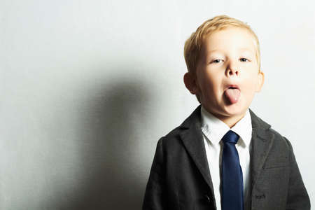 funny little boy in suit.style kid. fashion children.joyの写真素材