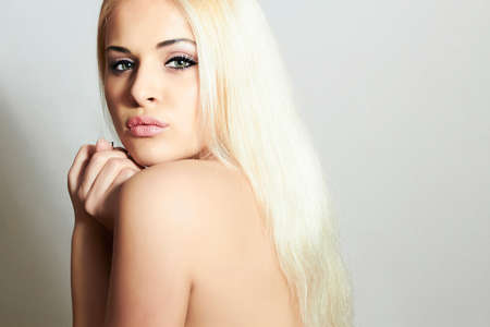 Young blond woman.Beautiful Girl.close-up fashion portraitの写真素材