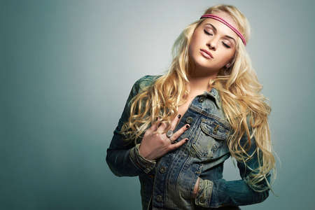 fashion beautiful girl in jeans. beauty blond woman. hippie style. accessoriesの写真素材