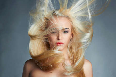 young beautiful woman with long hair.の写真素材