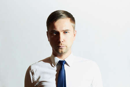 Fashion portrait of handsome man. Businessman.Young man in tie. Business concept. Serious Boyの写真素材
