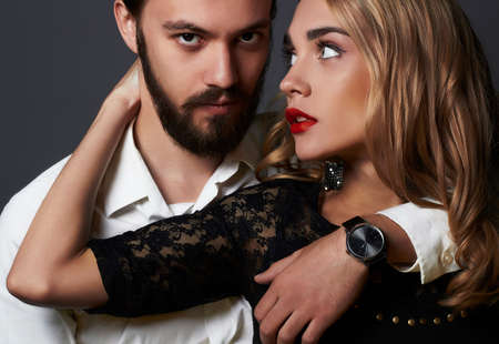 luxury fashionable couple in tender passion. Beautiful woman near the man.beauty girl and boy togetherの写真素材