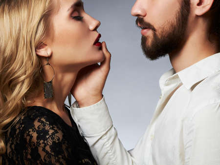 Kissing couple portrait.romantic beautiful woman and handsome man.lovely boy and girl