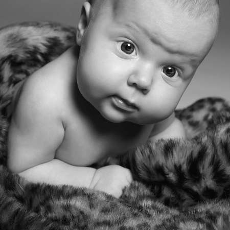 monochrome photo of newborn baby.funny little childの写真素材