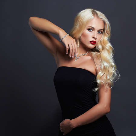beautiful blonde with the flying hair.sensual woman. girl with Jewelryの写真素材