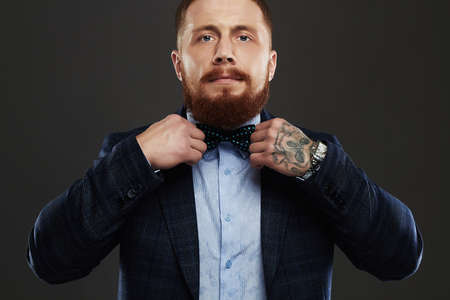 bearded man.Old Hipster boy.handsome man in hat and red beardの写真素材