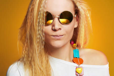 funny teenager girl in sunglasses.beauty young hipsterの写真素材