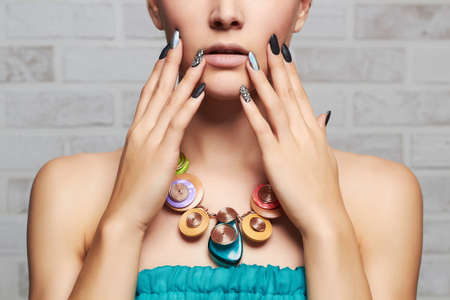 Fashion portrait. Make-up.manicure.trendy nails.beauty womanの写真素材