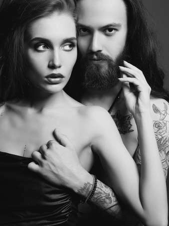 beautiful couple with tattoo.sexy woman and handsome man.lovely boy and girlの写真素材