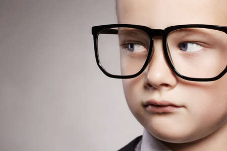 child's face.little boy in glasses.funny child in glasses.kidの写真素材