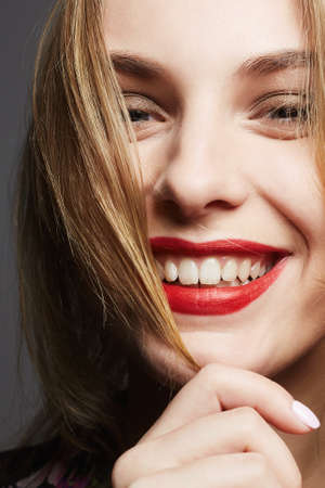 beautiful girls smile. happy young woman face. funny smiling ginger modelの写真素材