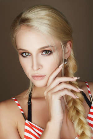 beautiful blonde woman with braided hair.beauty fashion portrait.blond sexy girl