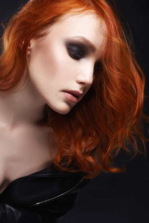 sexy Beautiful young woman red hair style. ginger girl with make-up fashion beauty portraitの写真素材