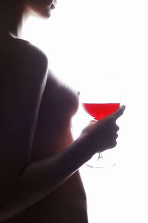 Nude Sexy Beautiful Wet Body Woman with Red Wine Glass. Naked Girl holding wineglassの写真素材