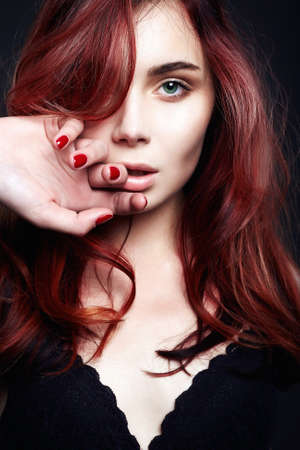 Beauty Girl Portrait. Healthy Red Hair. Beautiful Young Womanの写真素材
