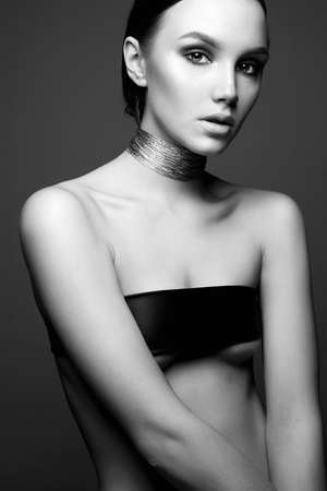 sexy Beautiful woman with necklace. Fashion studio portrait of beauty girlの写真素材