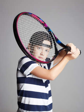 Little Boy Playing Tennis. Sport kids. Child with Tennis Racket