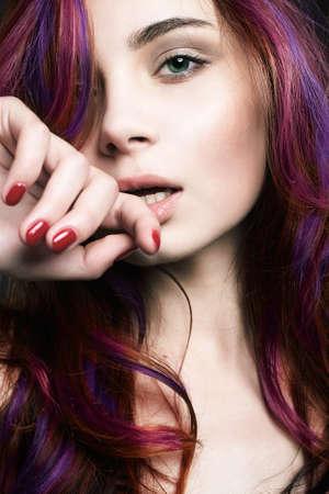 Beautiful young woman. color hair girl with make-upの写真素材