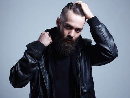 Fashionable young Man. Bearded Handsome Boy. Stylish hipster