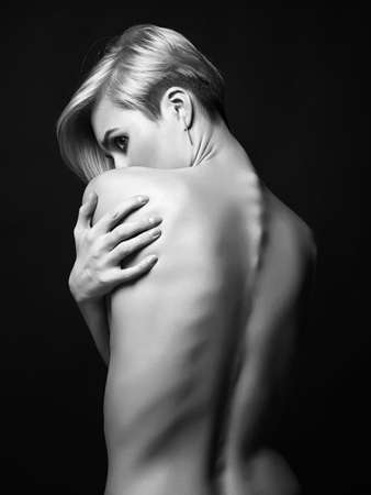 Female back. Naked beautiful Blonde Girl. Short Hair Girlの写真素材