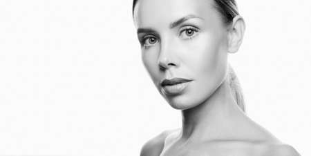 Beauty Woman face Black and white Portrait. Beautiful Spa model Girl with Perfect Fresh Clean Skin....