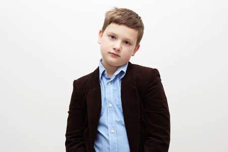 portrait of child. handsome little boy in a corduroy jacket. 11 years old kid