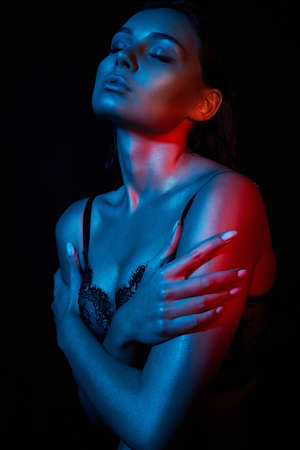 Beauty Rainbow woman in Underwear. Beautiful Girl in color bright lightsの写真素材