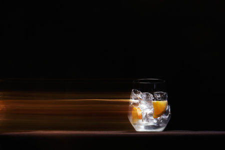 Ice and fruits in glass. beautiful still life. lemonade cocktail motionの写真素材