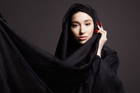 beautiful islamic young woman with long Nails. beauty girl in hijab. fashion oriental modelの写真素材