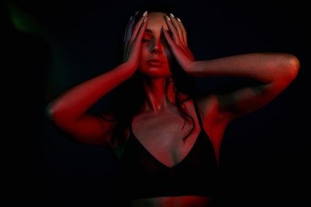 Woman in Underwear. Beautiful Girl in dark